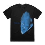 A black short-sleeve t-shirt featuring a large blue graphic print of a distorted face on the front, with the text 'fontaines d.c.'