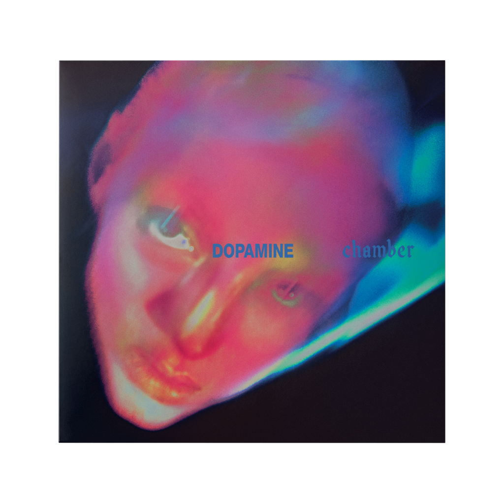 Album cover for 'Dopamine Chamber' featuring a distorted, colorful neon portrait of a face on a dark background.
