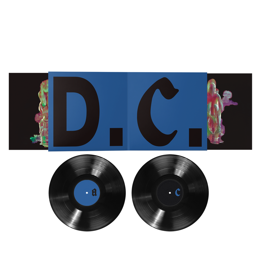 D.C. album vinyl set with a blue insert, and two black vinyl records.

